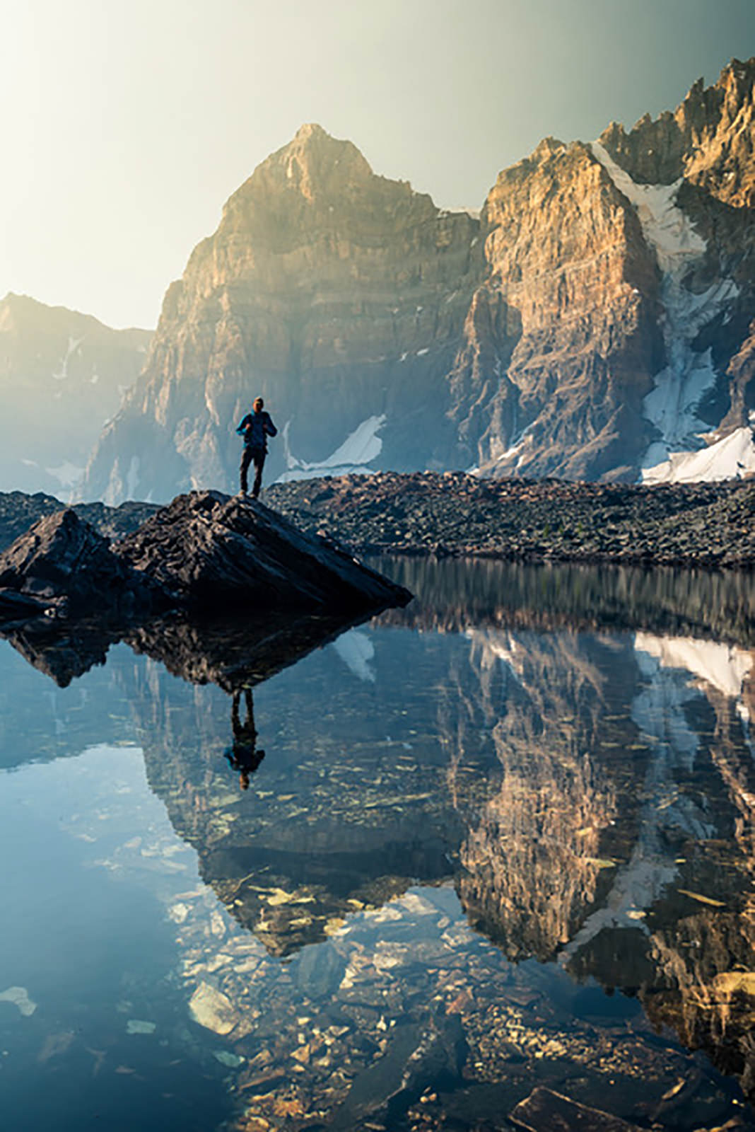 mountain peak with a perfect mirror reflection on a lake