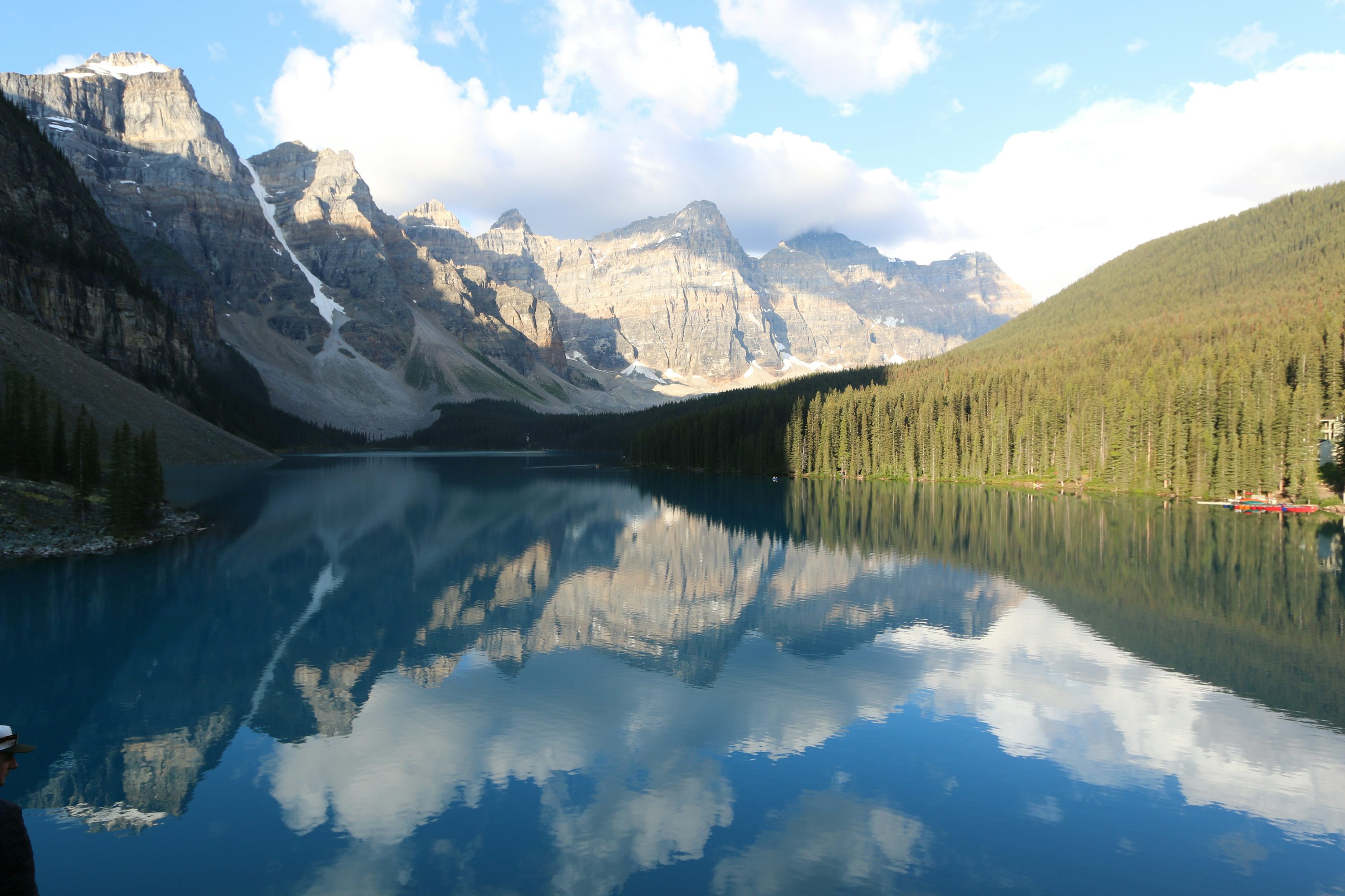 mountain peak reflected in a calm valley lake