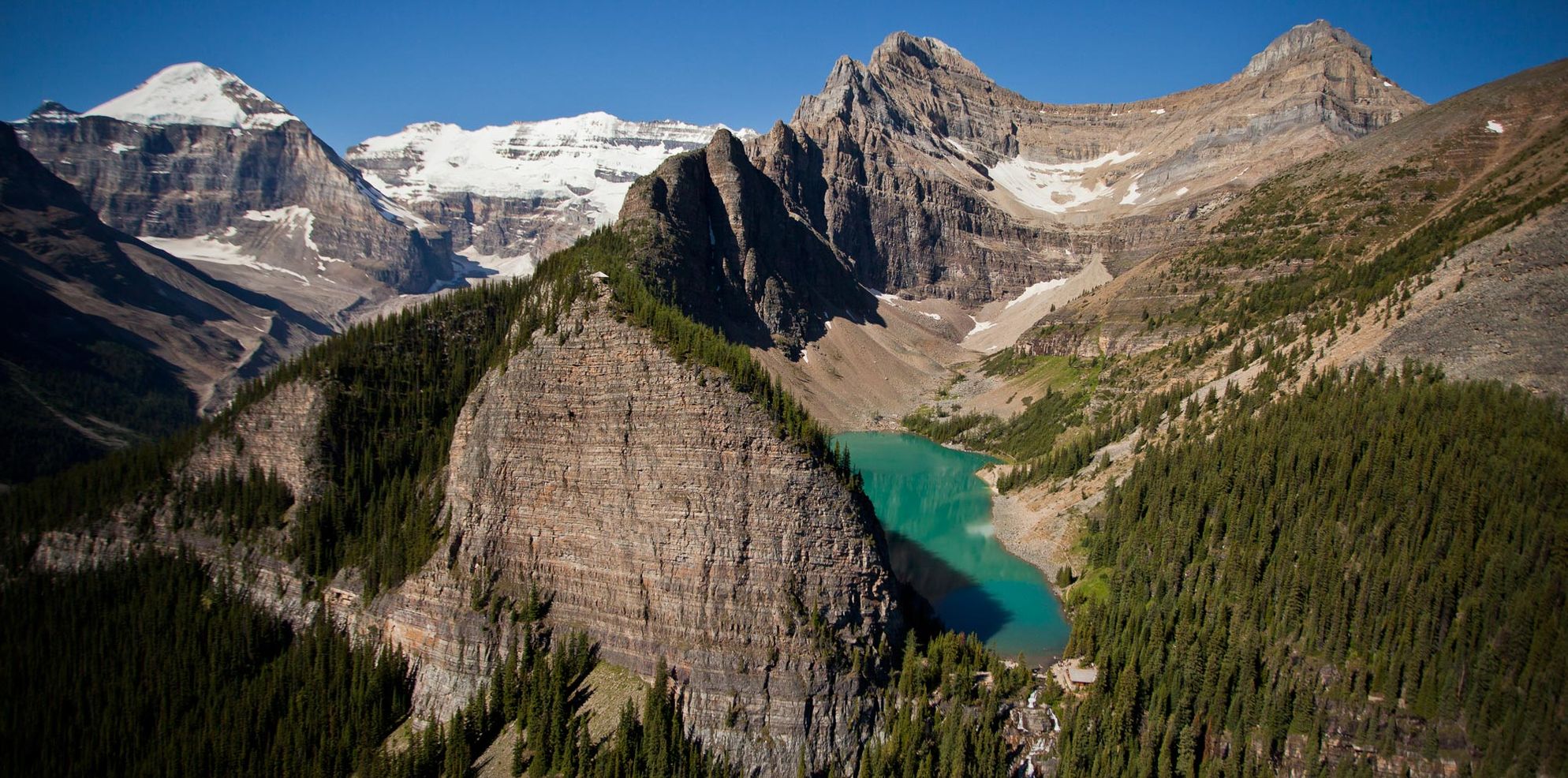 mountains rising above a river valley in Banff