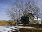 Abandoned residence at the edge of town